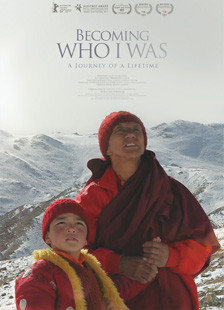 [movie poster with becoming who i was text in grey against a snowy mountainous background with young boy and elderly man both dressed warmly in shades of red holding hands and gazing upward]